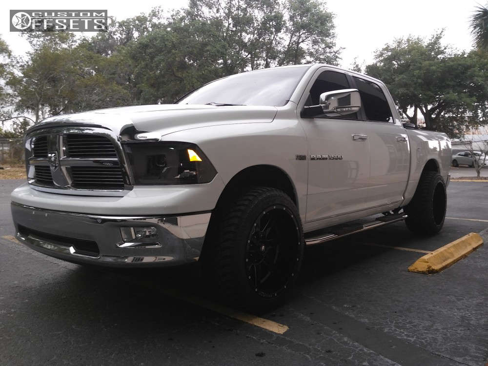 2011 Ram 1500 with 22x12 44 Ballistic Rage and 305/45R22 Atturo Trail