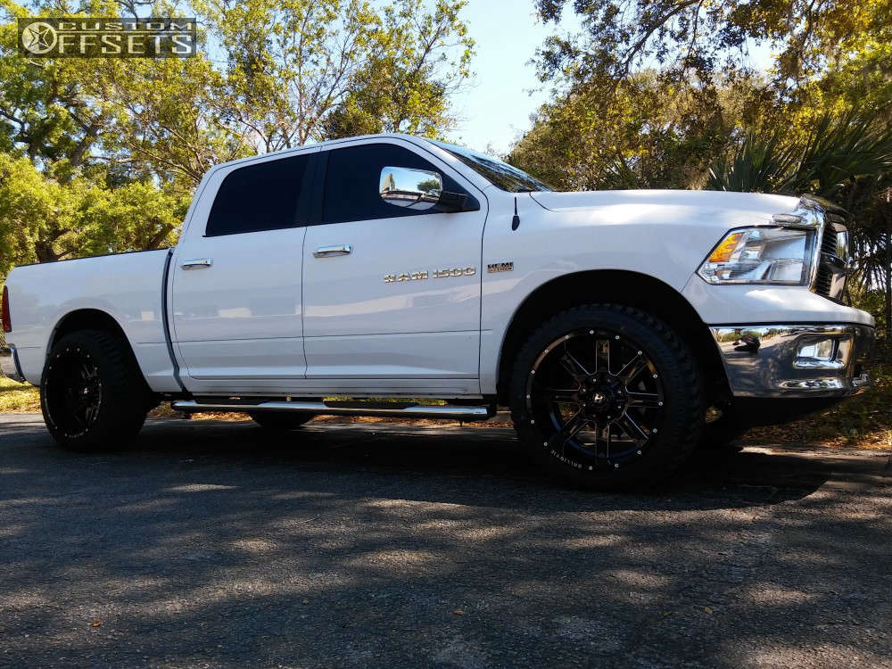 2011 Ram 1500 with 22x12 44 Ballistic Rage and 305/45R22 Atturo Trail