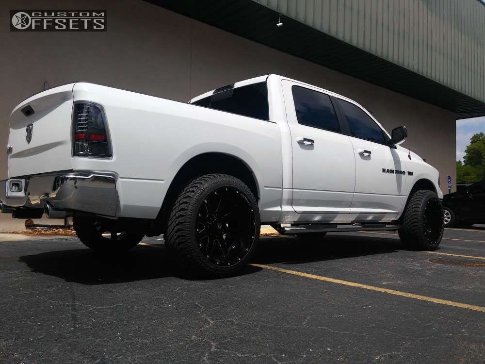 2011 Ram 1500 with 22x12 44 Ballistic Rage and 305/45R22 Atturo Trail