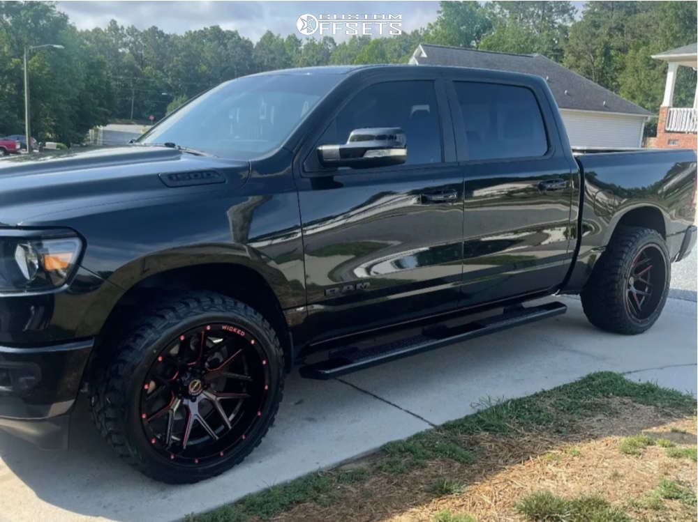 2019 Ram 1500 with 22x12 -44 Wicked Offroad W903 and 33/12.5R22