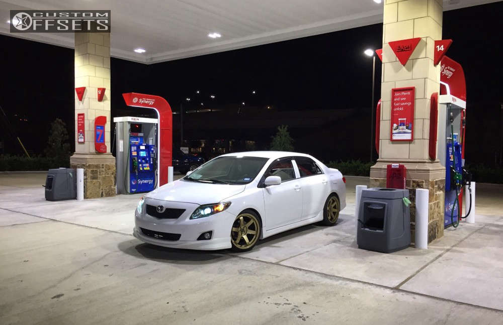 2010 Toyota Corolla with 18x9.5 38 Rota Grid and 225/40R18 Dunlop ...