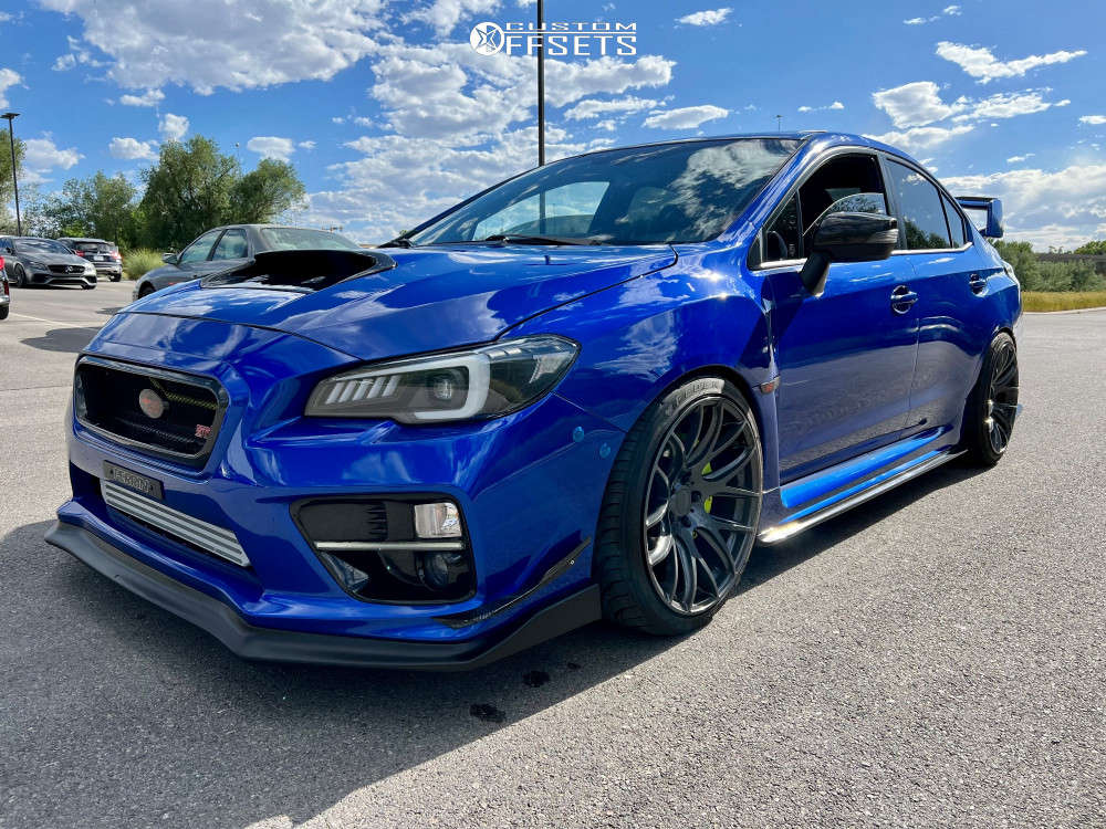 2016 Subaru WRX STI with 19x10.5 22 ESR Sr12 and 245/35R19 Federal