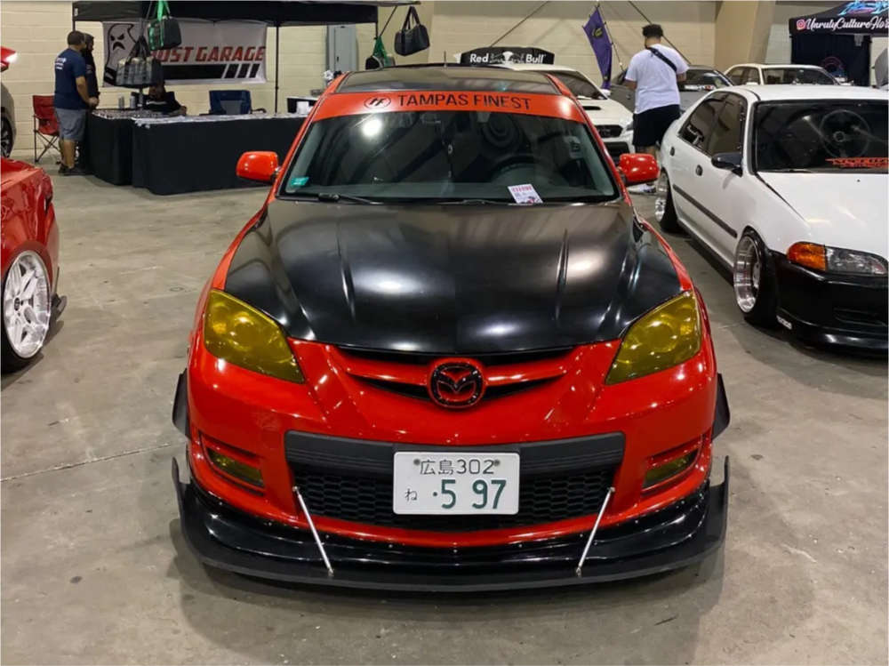 2008 Mazda 3 with 18x8.5 38 Enkei Nt03m and 225/40R18 Firestone