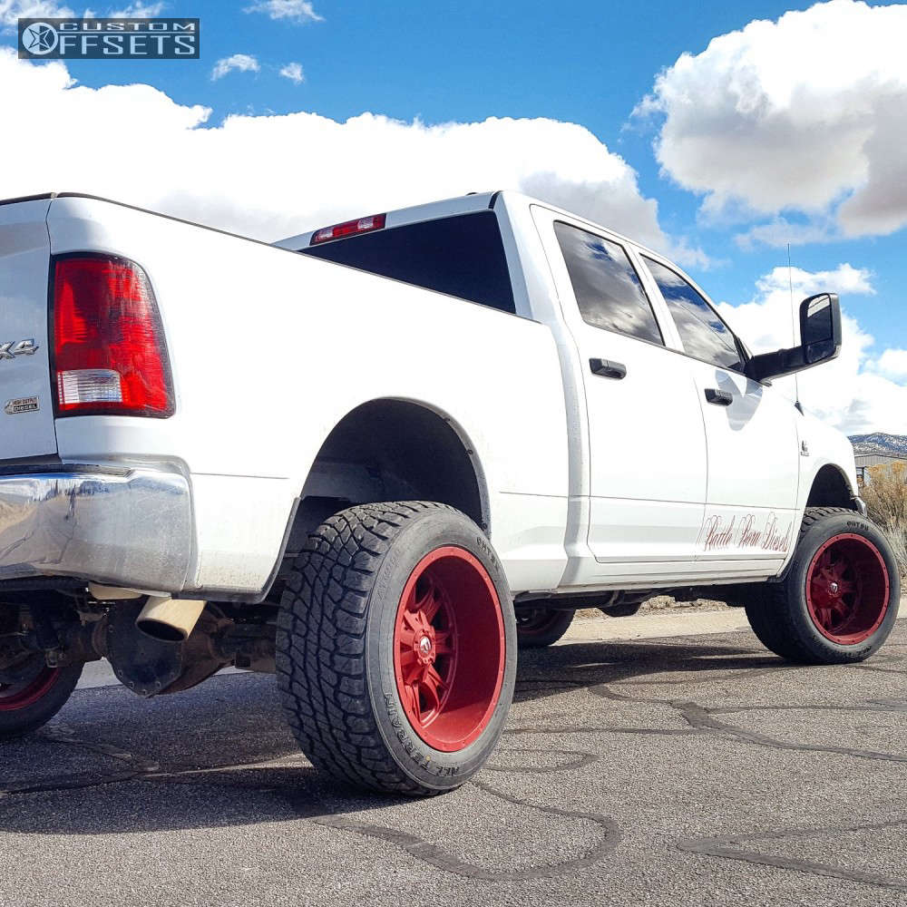 2012 Ram 2500 with 20x12 44 Fuel Throttle and 305/55R20 Ohtsu AT4000 and Leveling Kit Custom