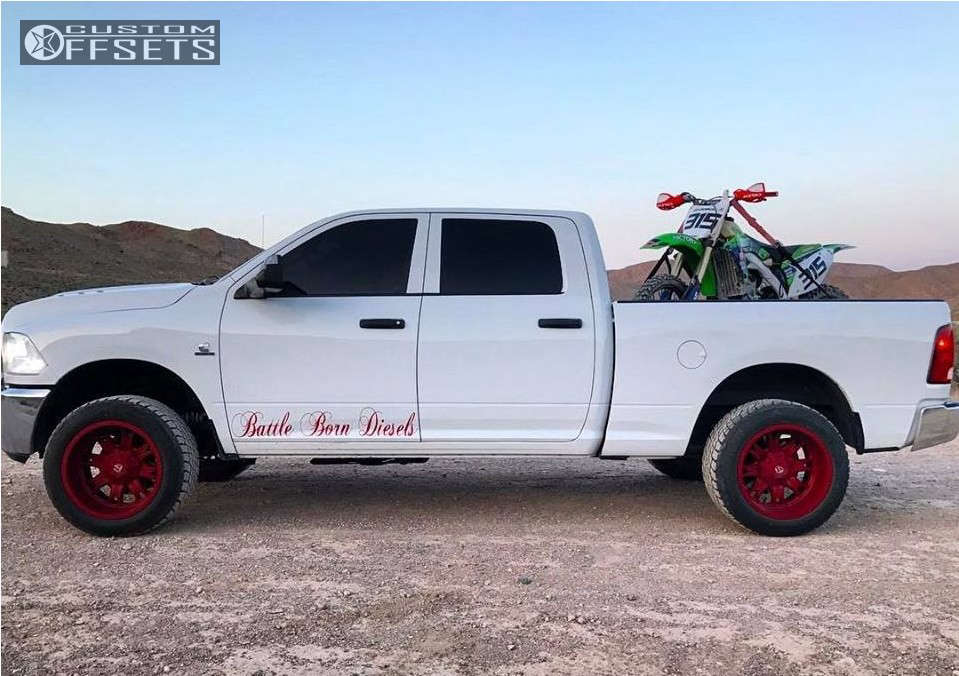 2012 Ram 2500 with 20x12 44 Fuel Throttle and 305/55R20 Ohtsu AT4000 and Leveling Kit Custom