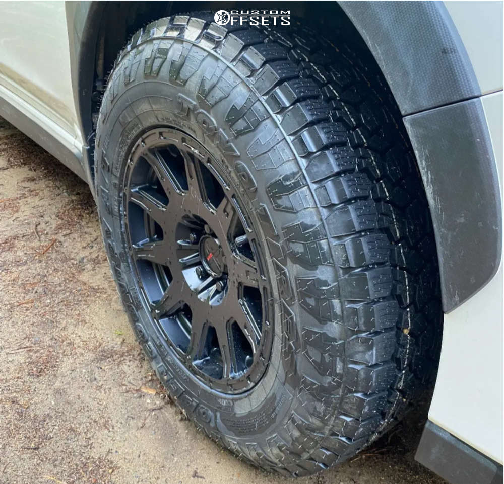 2021 Subaru Crosstrek with 15x7 15 DX4 XTrail and 215/75R15 Toyo Tires