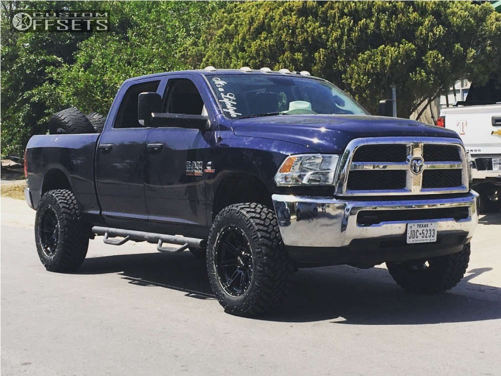 2014 Ram 2500 with 20x10 -24 Helo He900 and 295/65R20 Nitto Trail ...