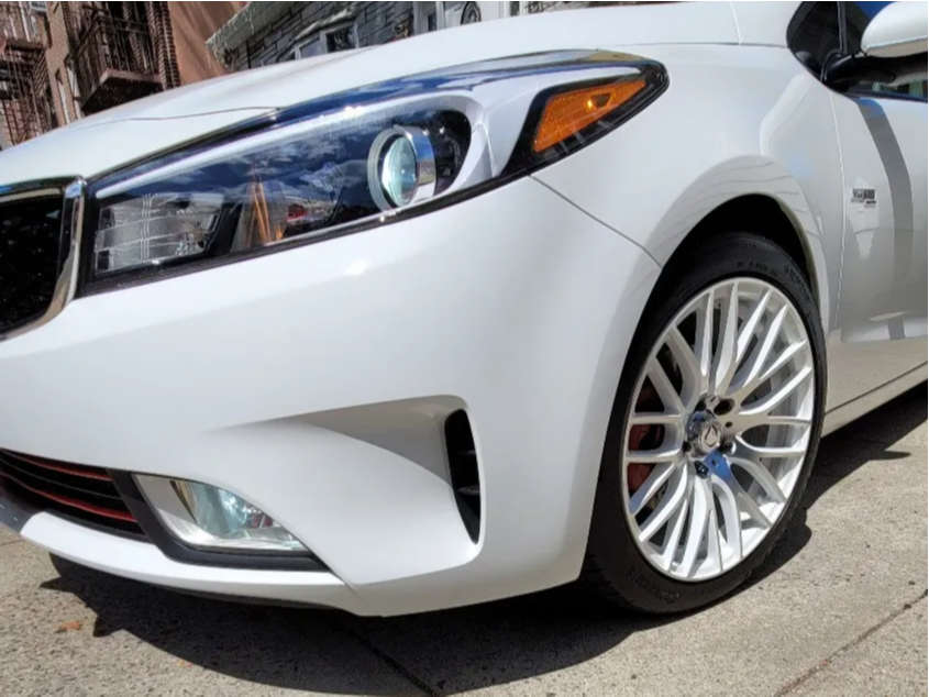 2018 Kia Forte with 17x7.5 38 DDR Zuki and 215/45R17 Continental