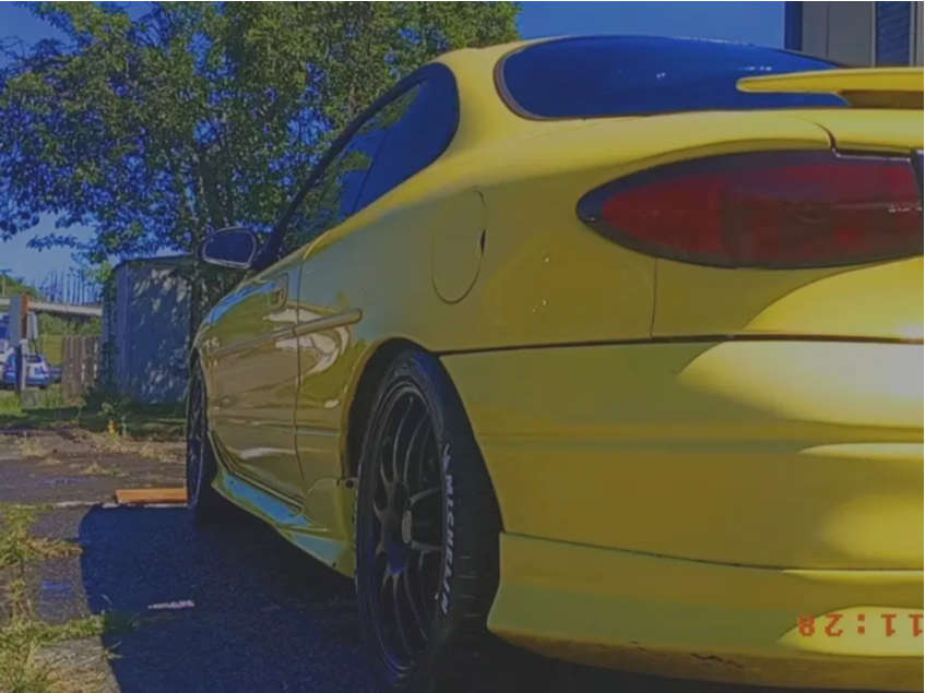 2000 Ford Zx2 with 17x7.5 40 Enkei PF01 and 215/45R17 Michelin
