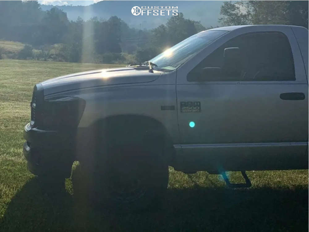 2009 Dodge Ram 2500 with 17x9 -12 Vision D Window and 285/70R17 Venom ...