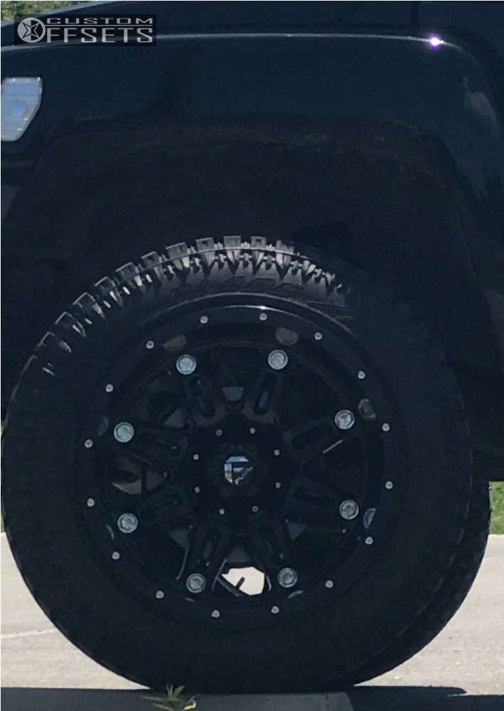 2007 Hummer H3 with 20x14 76 Fuel Hostage and 33/12.5R20 Atturo Trail