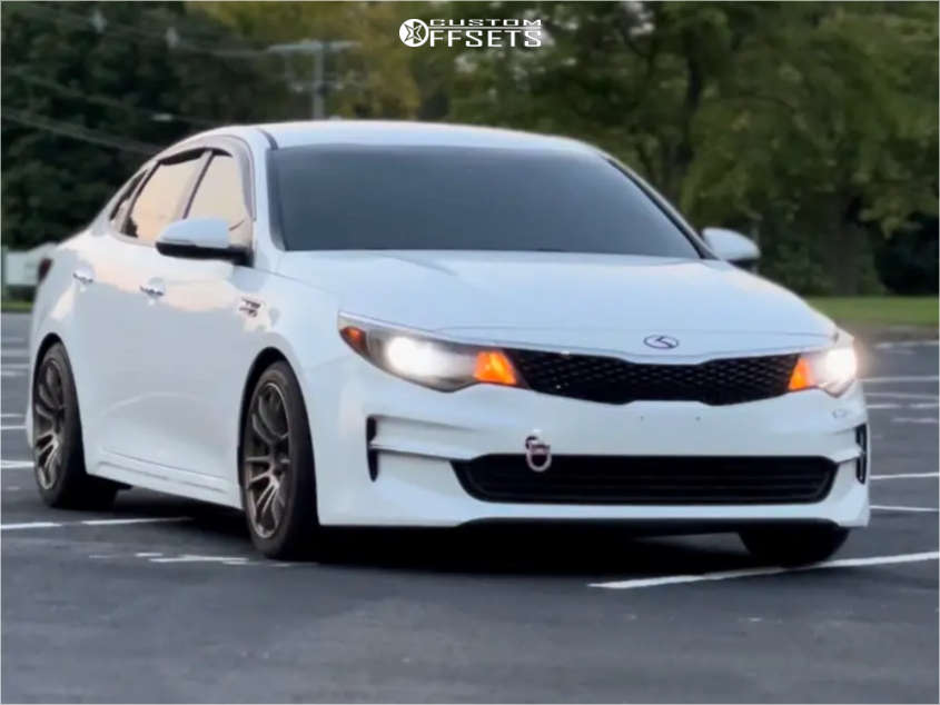 2016 Kia Optima with 17x8 35 AVID1 Av20 and 215/45R17 Bridgestone