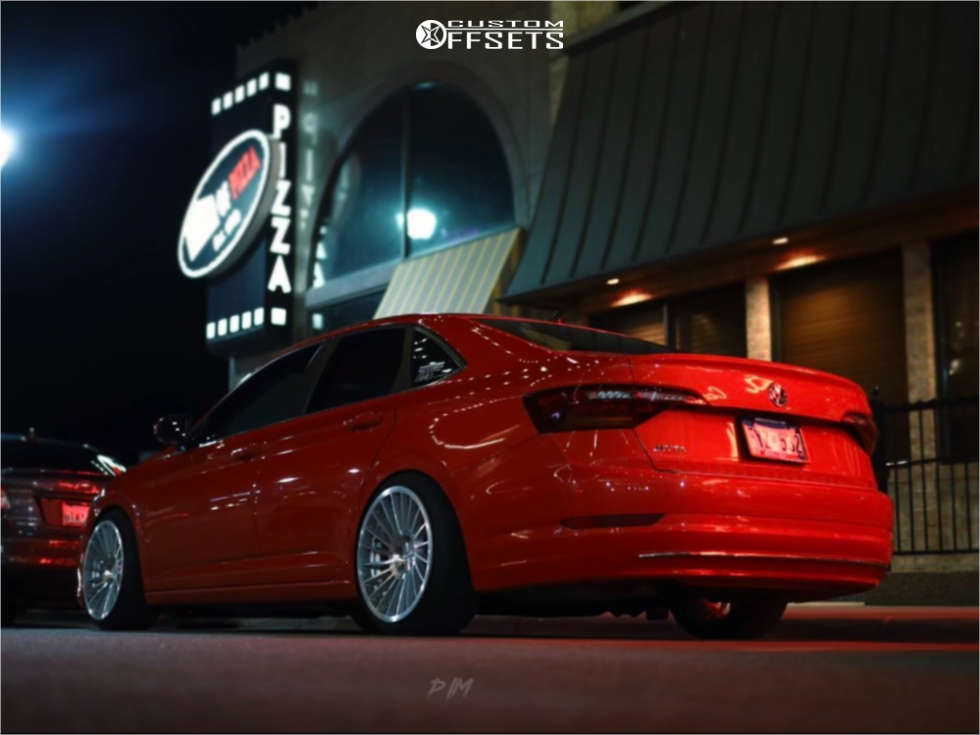 2019 Volkswagen Jetta with 18x9.5 35 Rotiform Ind-t and 215/40R18