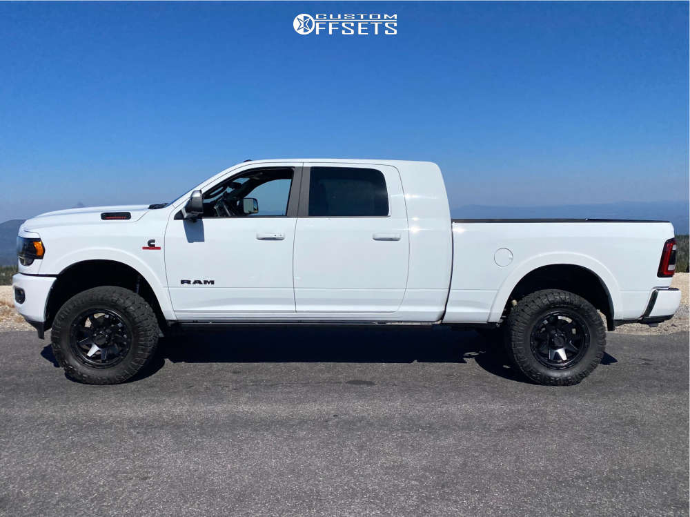 2022 Ram 2500 with 20x9 18 Method Mr317 and 35/12.5R20 Nitto Trail