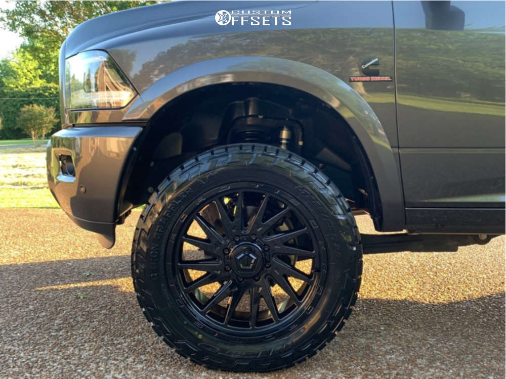 2018 Ram 2500 with 22x10 10 TIS 547B and 285/55R22 Nitto Recon
