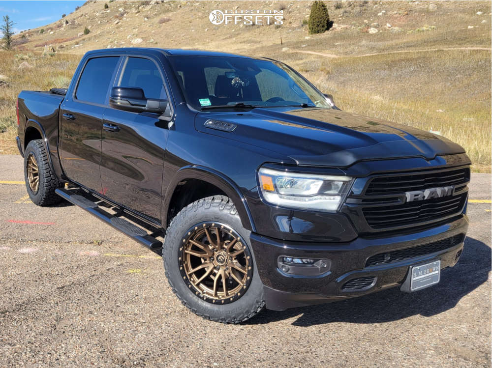 2021 Ram 1500 with 20x10 -18 Fuel Rebel and 275/55R20 Cooper