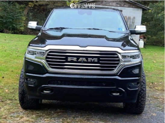 2019 Ram 1500 with 22x12 -44 TIS 547C and 33/12.5R22 Venom Power