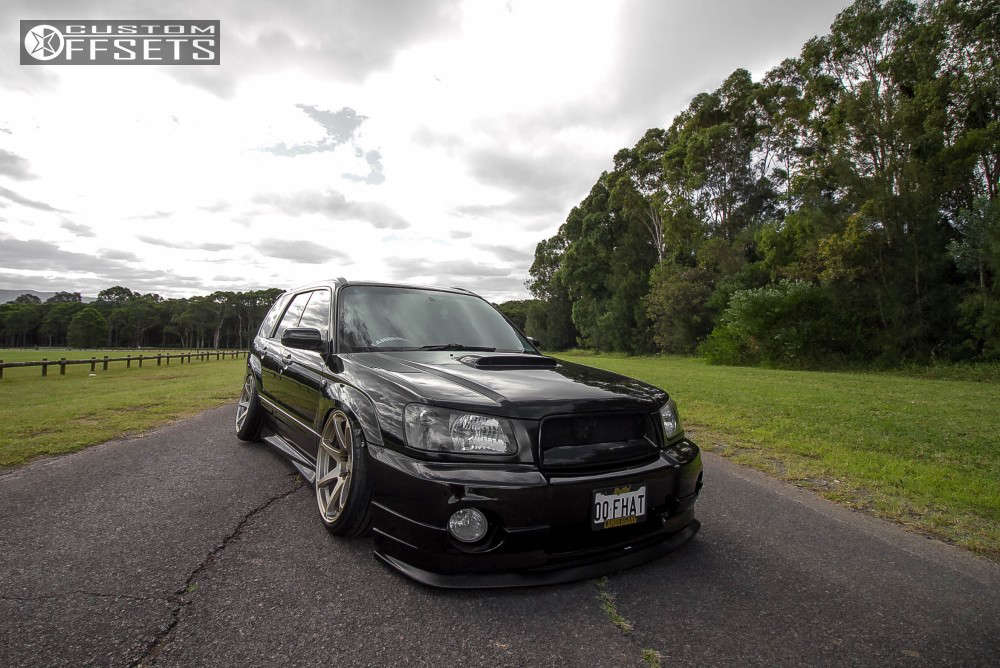 2004 Subaru Forester with 18x9.5 -10 CST Hyper Zeros and 225/40R18