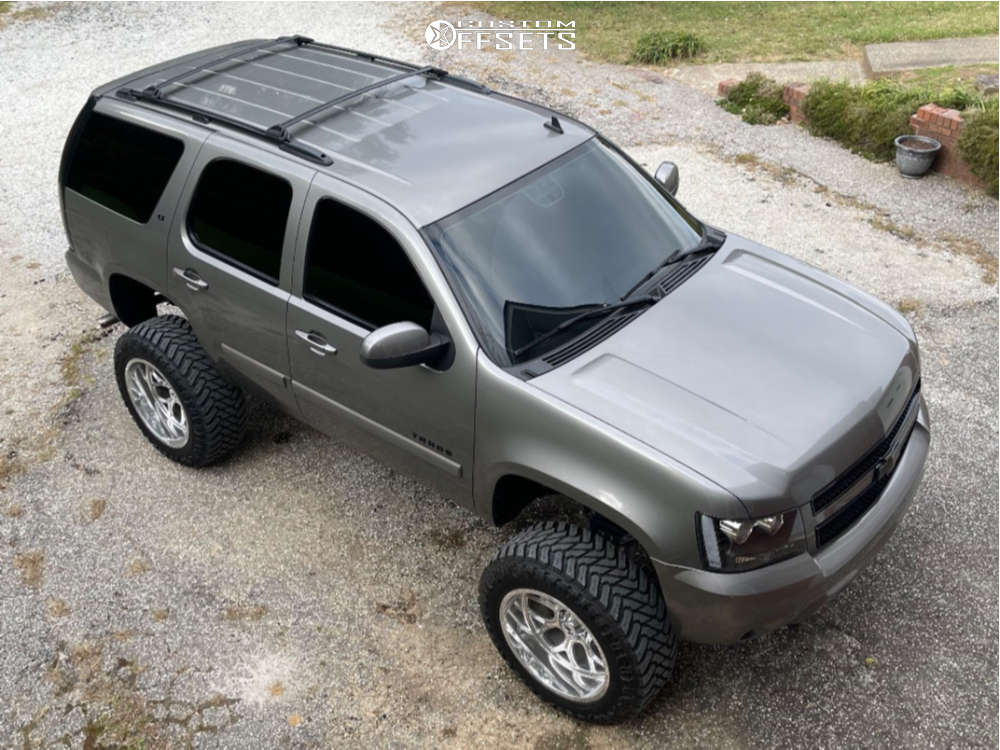 2007 Chevrolet Tahoe with 22x12 44 Hostile Punisher and 37/13