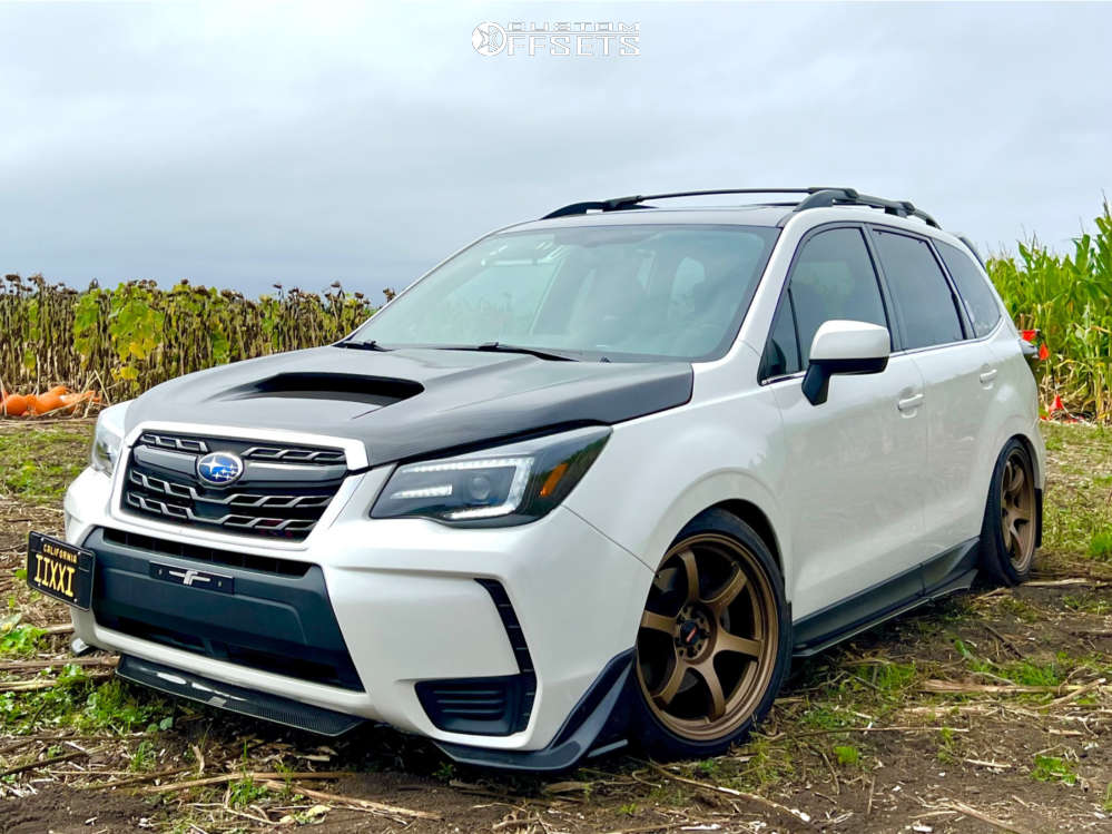 2017 Subaru Forester with 18x9.5 38 Gram Lights 57dr and 245/40R18