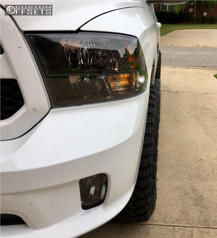 2017 Ram 1500 with 18x9 1 Fuel Ripper and 305/70R18 Kanati Mud Hog and