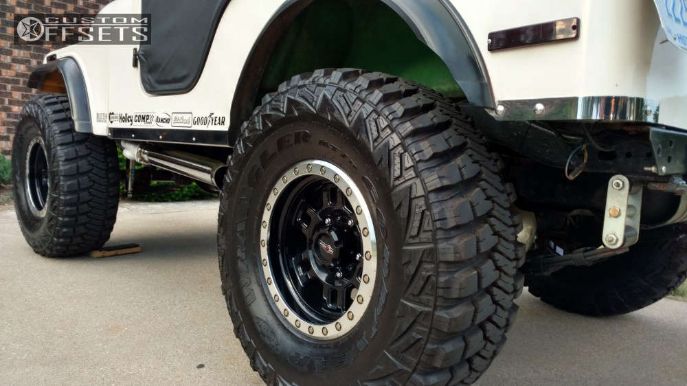 1979 Jeep Wrangler with 15x8 19 Vision Manx and 33/12.5R15 Goodyear