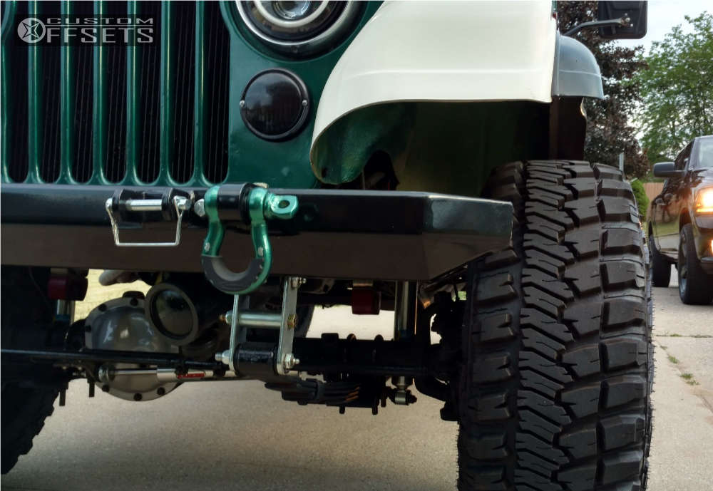 1979 Jeep Wrangler with 15x8 19 Vision Manx and 33/12.5R15 Goodyear