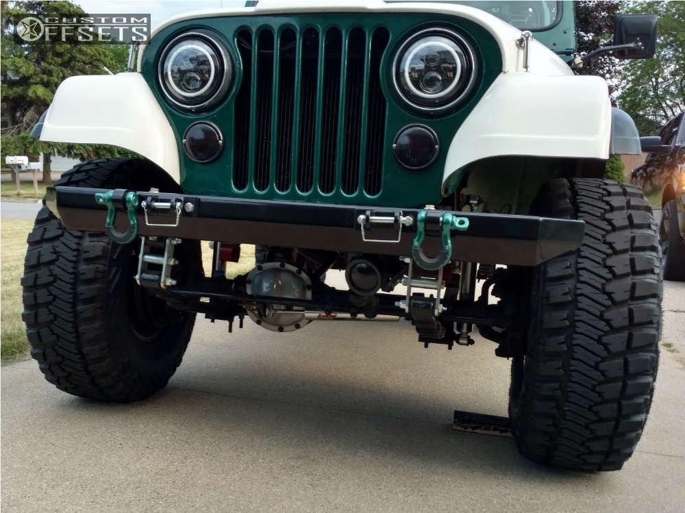 1979 Jeep Wrangler with 15x8 19 Vision Manx and 33/12.5R15 Goodyear