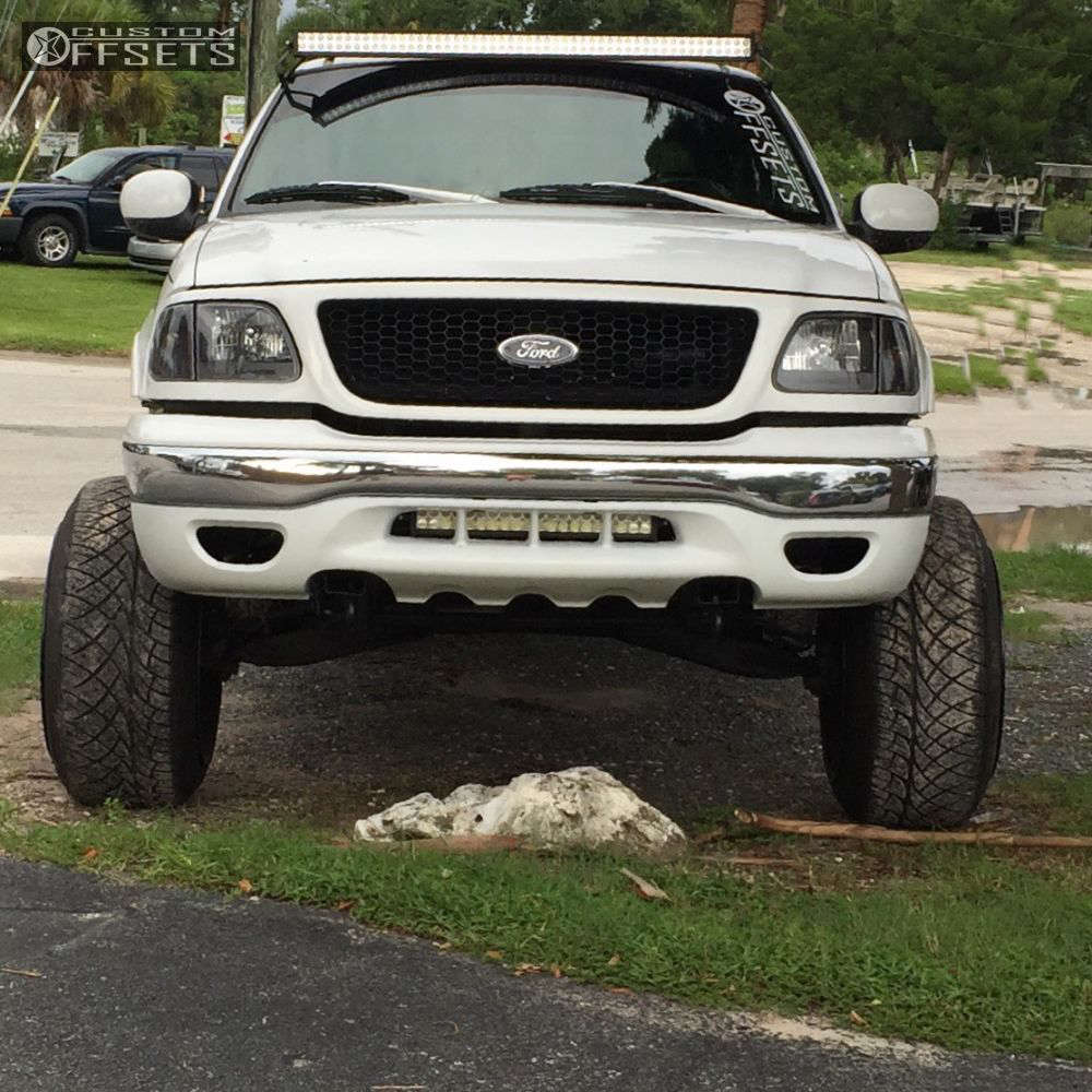 2001 Ford F150 with 22x14 76 Fuel Hostage and 305/45R22 Nitto NT420V