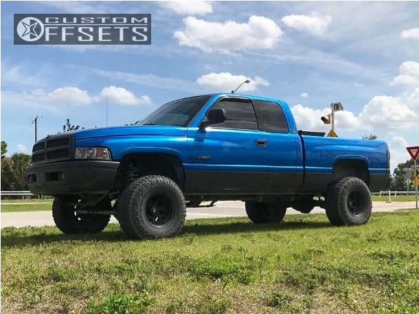 1999 Dodge Ram 1500 with 15x10 -47 Pro Comp Series 69 and 33/12.5R15 ...