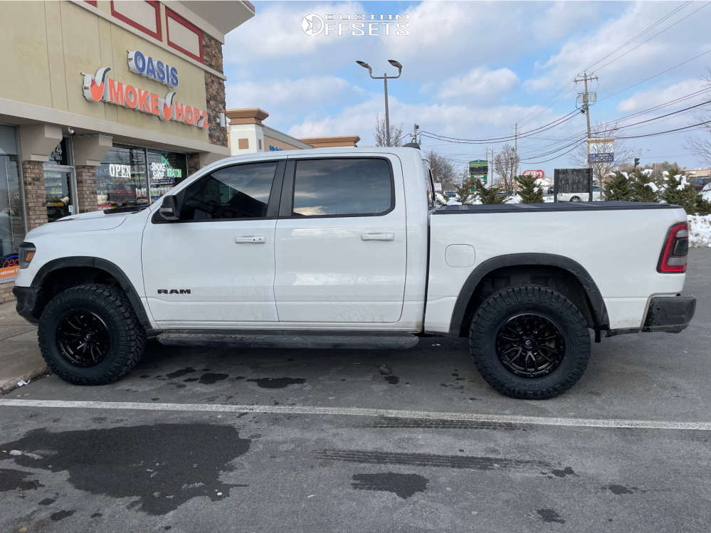 2021 Ram 1500 with 18x9 -12 Fuel Rebel 6 and 285/75R18 Nitto Ridge ...