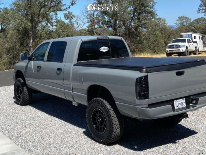 2006 Dodge Ram 2500 with 18x9 18 Method MR305 and 35/12.5R18 Venom ...