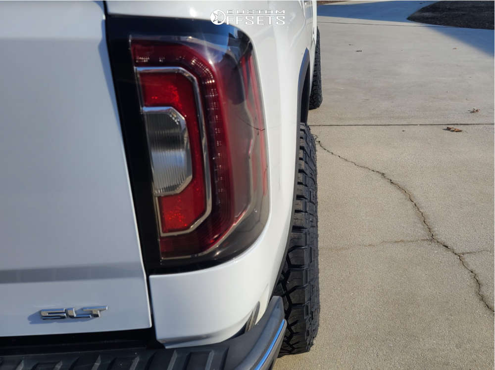 2017 GMC Sierra 1500 with 17x8.5 Method Mr317 and 285/75R17 Nitto Ridge ...
