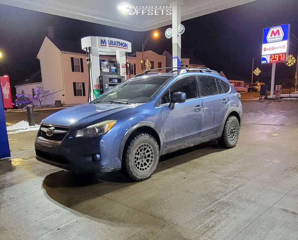 2014 Subaru XV Crosstrek with 15x7 15 Black Rhino Boxer and 215/75R15 ...