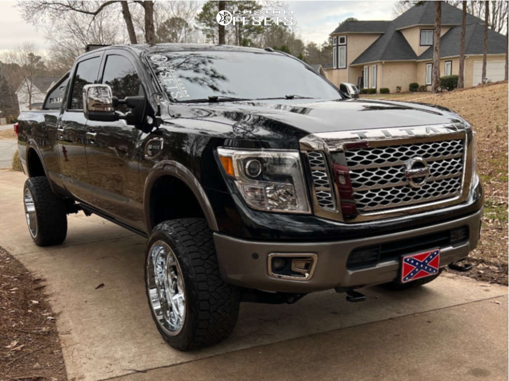2018 Nissan Titan XD with 22x12 -44 Axe Offroad Nemesis and 305