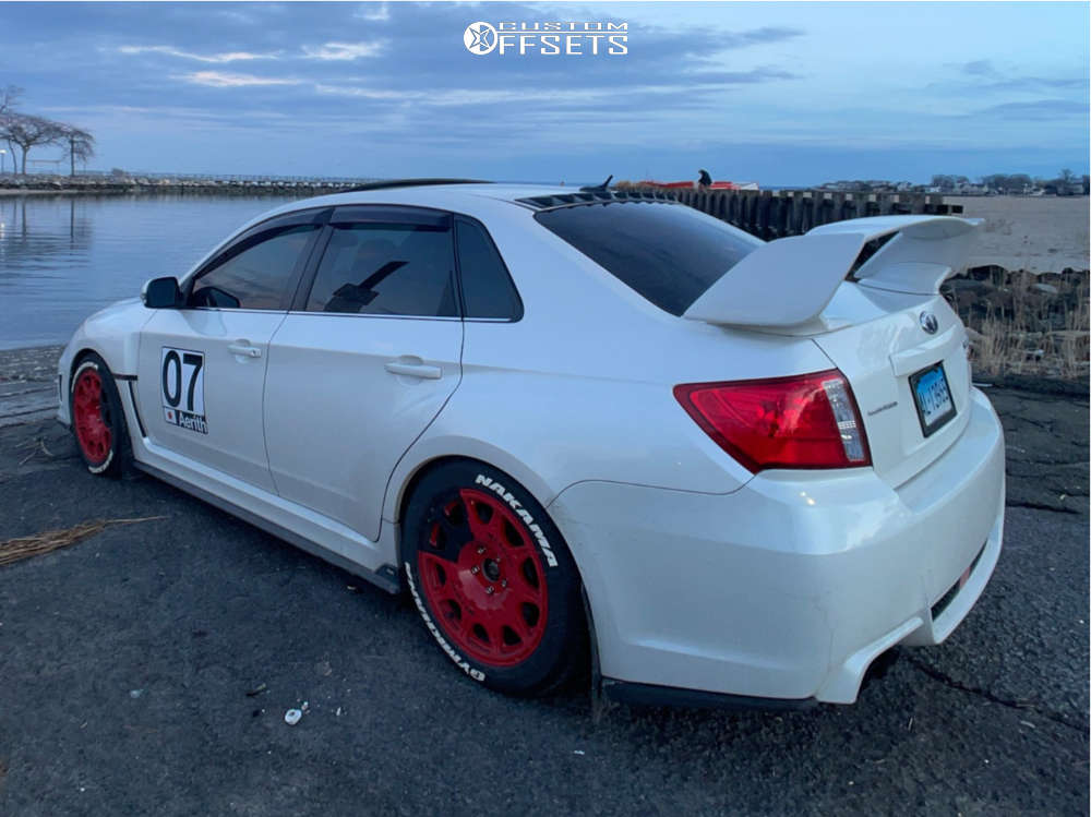 2013 Subaru Impreza with 17x8 38 Method Mr502 and 235/45R17