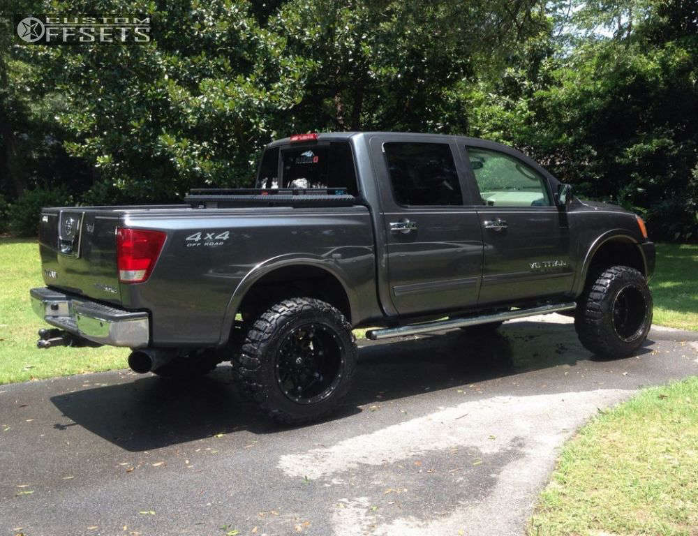 2010 Nissan Titan with 20x14 76 Fuel Hostage and 35/12.5R20 Nitto Mud