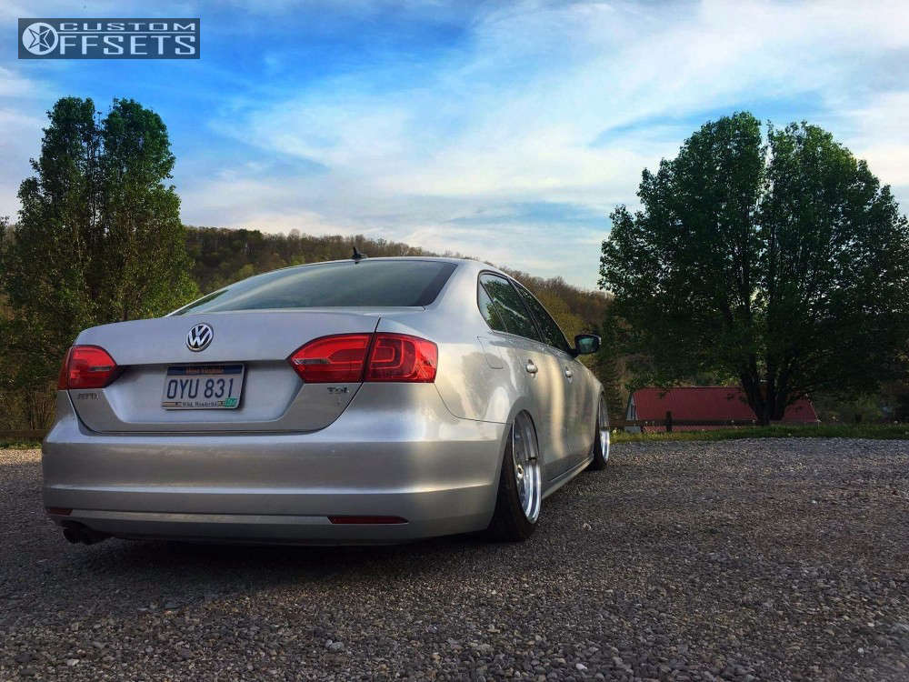 2014 Volkswagen Jetta with 18x8.5 32 ESR Sr02 and 205/35R18 Nitto Neo