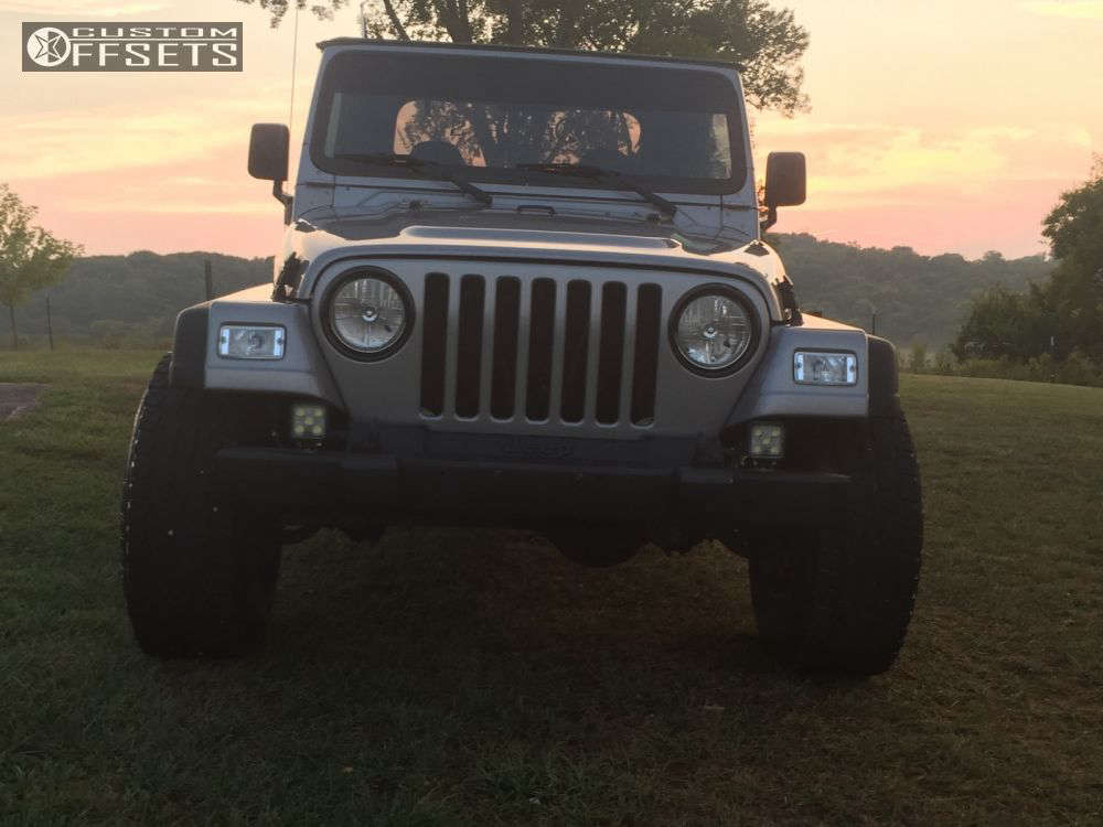 2002 Jeep Wrangler with 15x10 43 Fuel Revolver and 32/11.5R15 Falken WildPeak AT3W and Stock