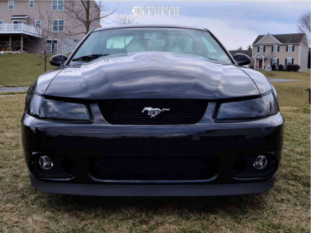 2002 Ford Mustang with 18x9 35 XXR 527d and 275/40R18 Continental ...