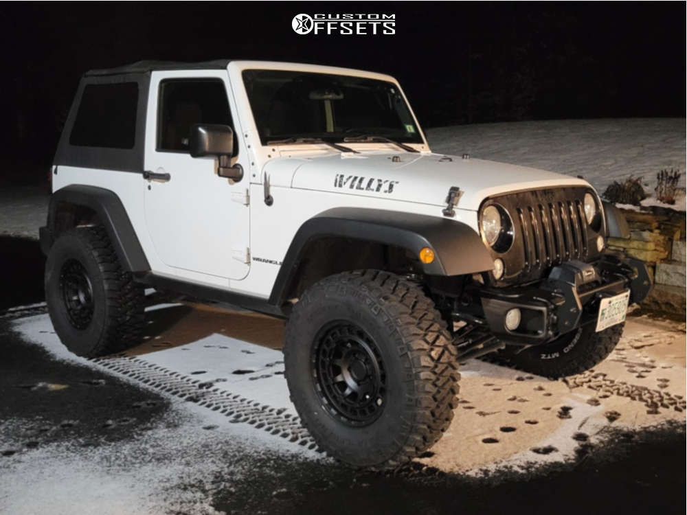 2014 Jeep Wrangler with 17x8.5 -18 Black Rhino Chamber and 315