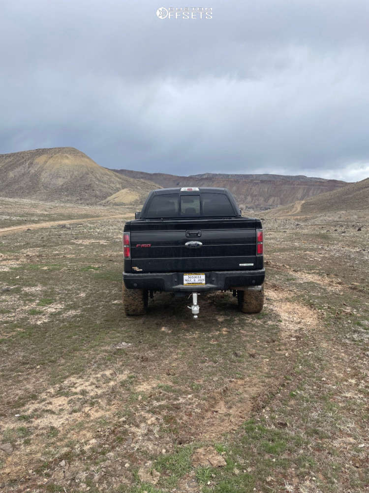 2013 Ford F150 with 22x12 44 Fuel Hostage and 35/12.5R22 Nitto Mud