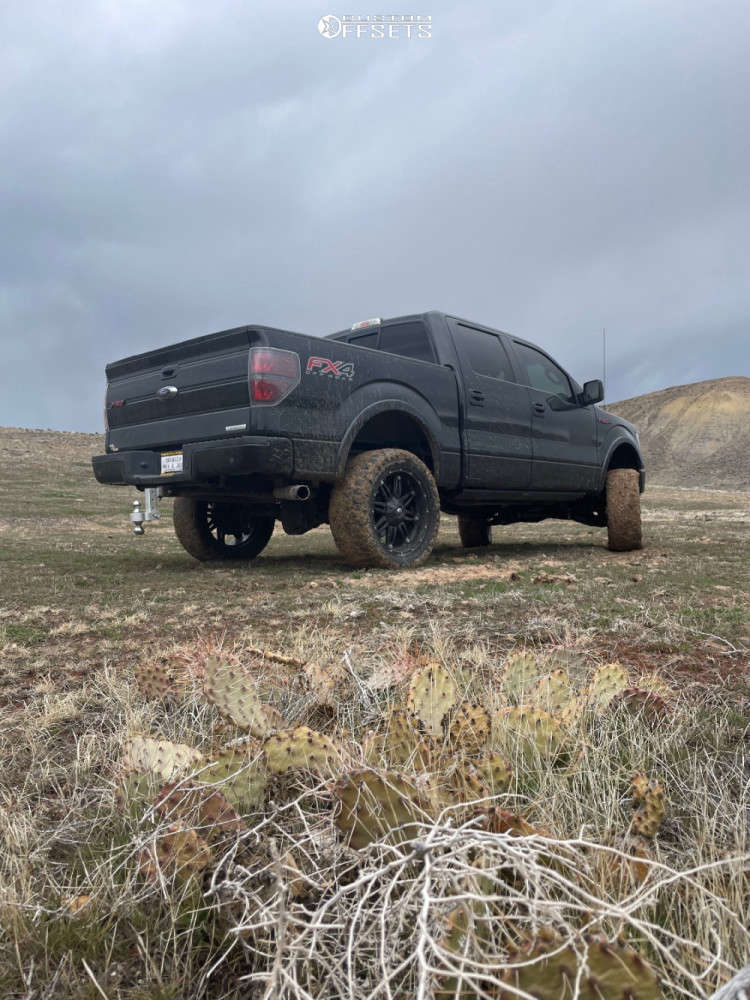 2013 Ford F150 with 22x12 44 Fuel Hostage and 35/12.5R22 Nitto Mud