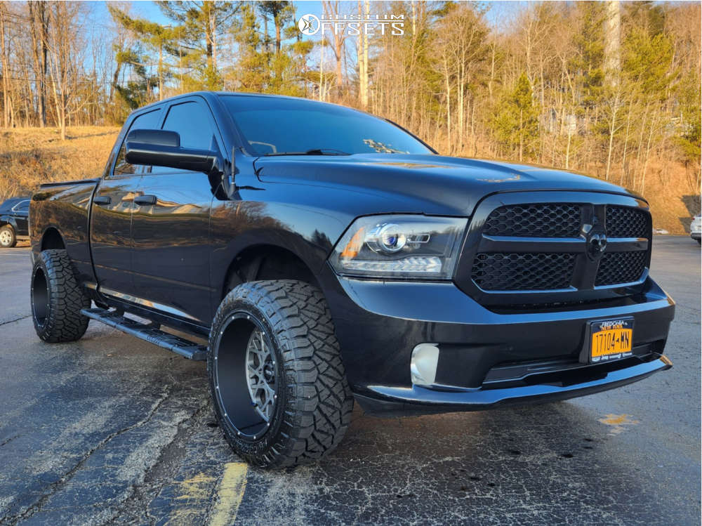 2018 Ram 1500 with 20x12 -51 Vision Rocker and 33/12.5R20 Nitto Ridge ...