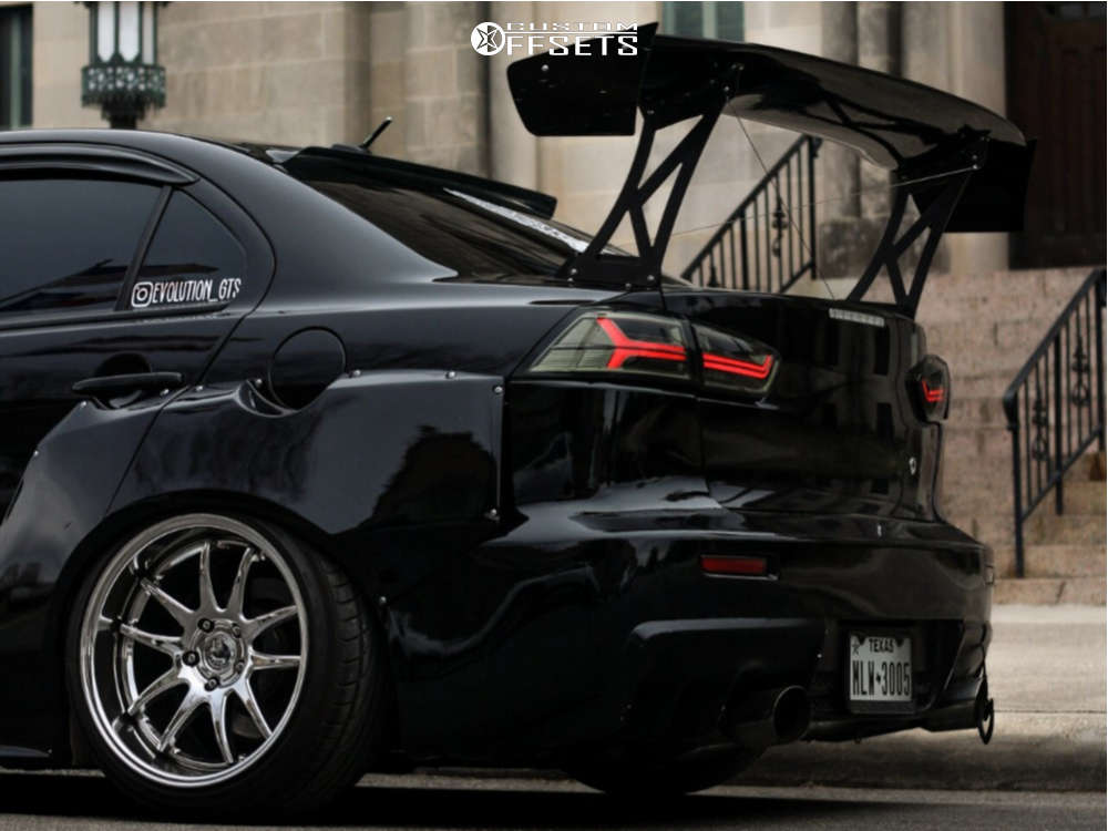 2009 Mitsubishi Lancer with 18x10.5 15 Aodhan Ds02 and 255/40R18