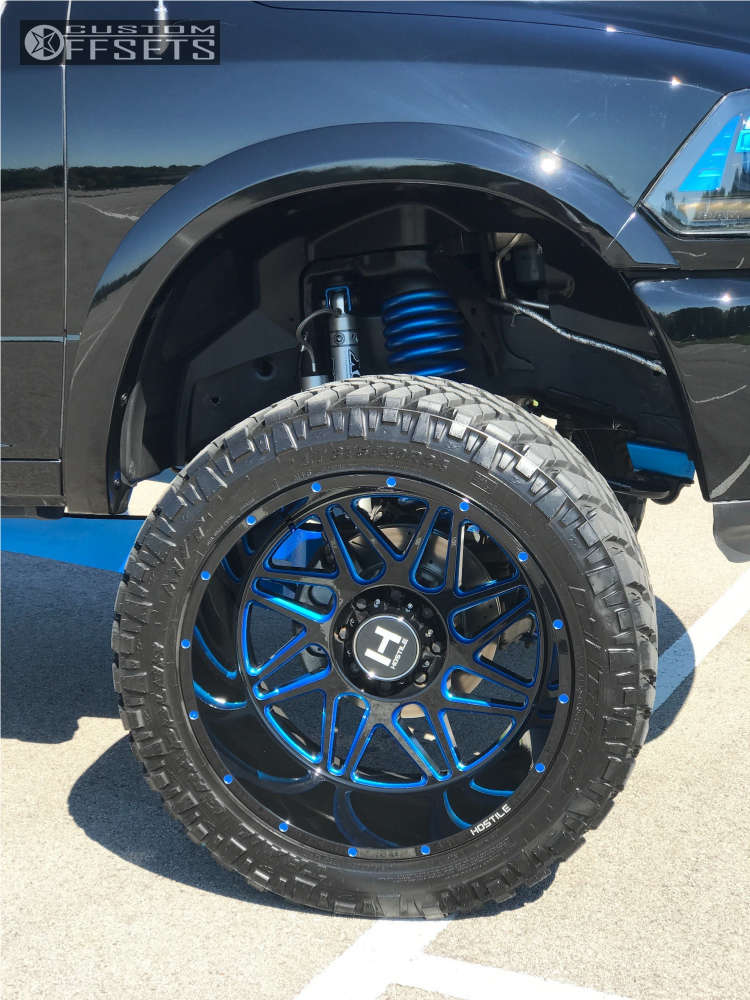 2014 Dodge Ram 2500 with 24x14 76 Hostile Sprocket and 375/40R24 Nitto