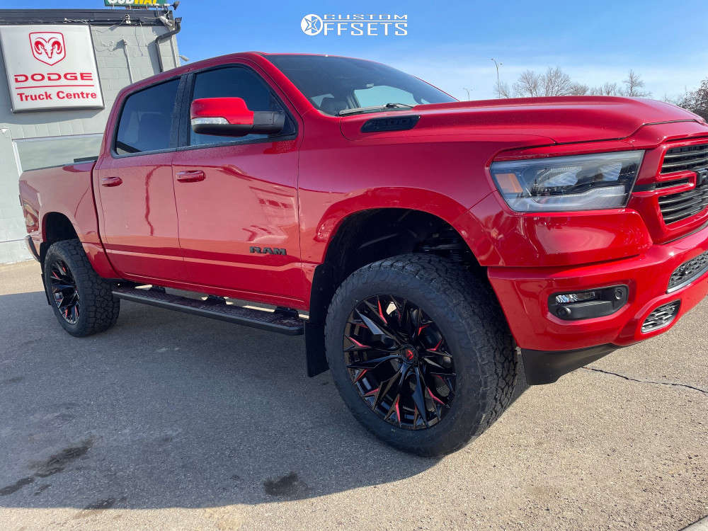2022 Ram 1500 with 22x10 18 Fuel Flame 6 and 35/12.5R22 Toyo Tires