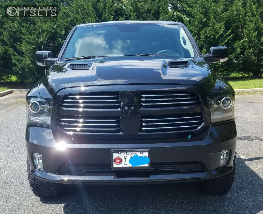 2017 Ram 1500 with 18x9 1 Fuel Hostage and 295/70R18 Nitto Ridge