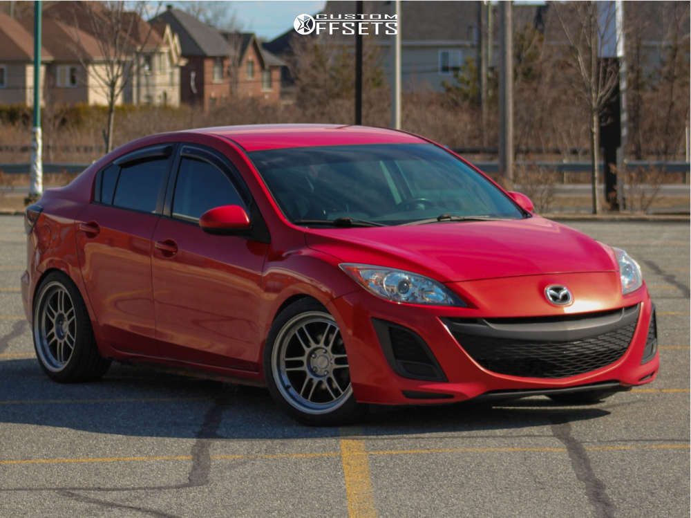 2011 Mazda 3 with 18x8.5 30 ESR Sr11 and 215/45R18 Cooper