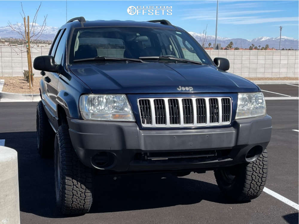 2004 Jeep Grand Cherokee with 16x8 Vision Flow and 265/75R16 Falken